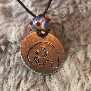 Handmade elephant necklaces!